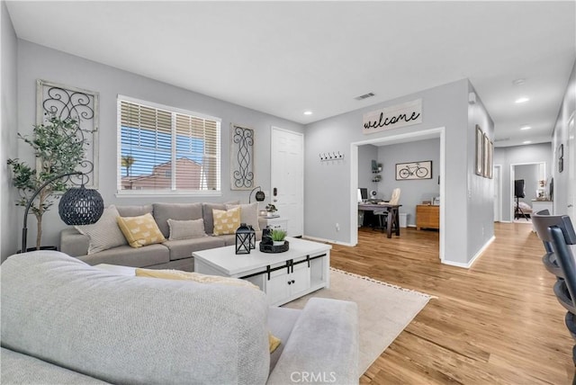 31164 Twilight Vista Dr, Menifee, CA 92584 - living area featuring light wood-style flooring, recessed lighting, and an office area