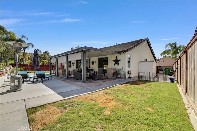 31164 Twilight Vista Dr, Menifee, CA 92584 - rear view of house featuring a fenced backyard, a patio area, an outdoor living space, and stucco siding