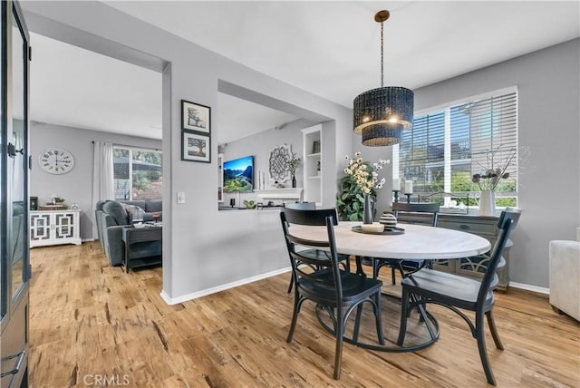31164 Twilight Vista Dr, Menifee, CA 92584 - dining area with light wood-style floors and baseboards