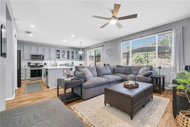 31164 Twilight Vista Dr, Menifee, CA 92584 - living room featuring ceiling fan, light wood-style floors, and recessed lighting