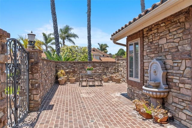 1200 Cerca, San Clemente, CA 92673 - view of patio / terrace featuring outdoor dining space and a gate