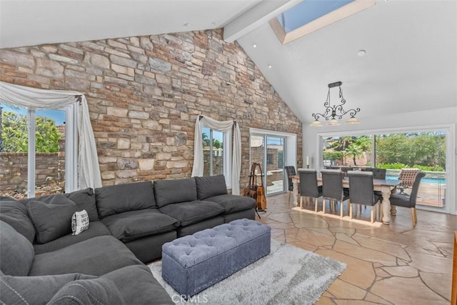 1200 Cerca, San Clemente, CA 92673 - living room featuring high vaulted ceiling, beamed ceiling, a chandelier, and light stone finish flooring