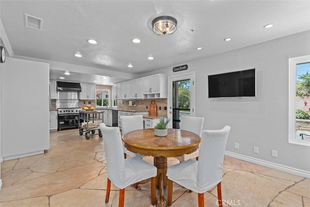 1200 Cerca, San Clemente, CA 92673 - dining area featuring recessed lighting, plenty of natural light, and light tile patterned floors