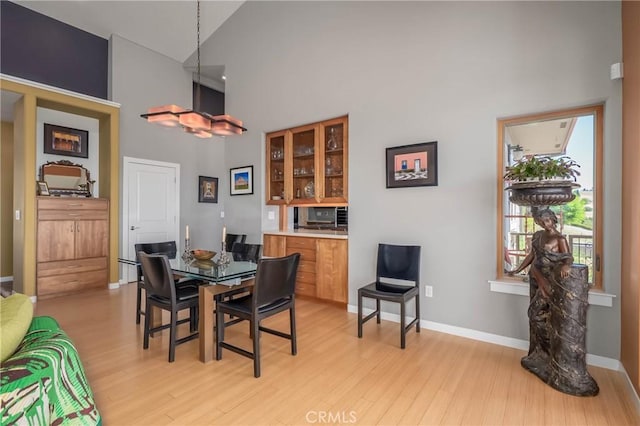 3165 Keeling Ave, Lakeport, CA 95453 - dining room with a high ceiling and light wood-style flooring