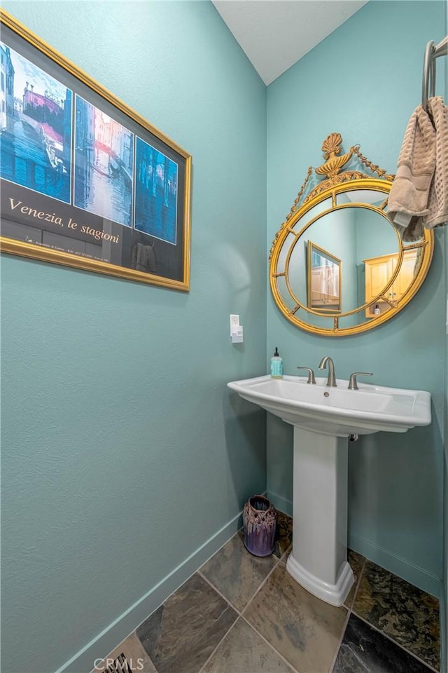 3165 Keeling Ave, Lakeport, CA 95453 - bathroom with baseboards and stone tile floors