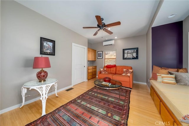 3165 Keeling Ave, Lakeport, CA 95453 - living area featuring light wood-style flooring, a ceiling fan, a wall mounted AC, and recessed lighting