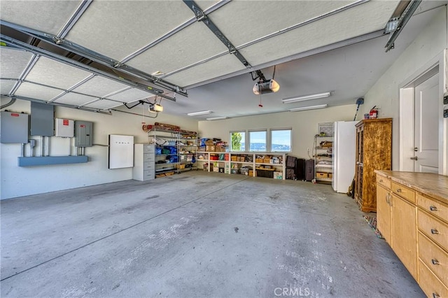 3165 Keeling Ave, Lakeport, CA 95453 - garage featuring electric panel and a garage door opener