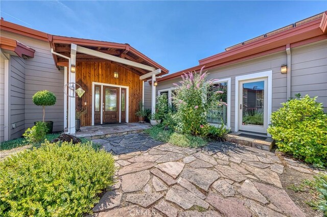 3165 Keeling Ave, Lakeport, CA 95453 - view of exterior entry with board and batten siding and a porch