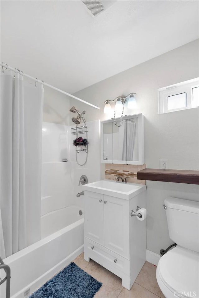 23859 S Rd, Apple Valley, CA 92307 - bathroom with shower / tub combo with curtain, tile patterned floors, vanity, and decorative backsplash