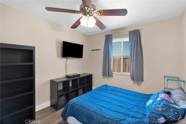 23859 S Rd, Apple Valley, CA 92307 - bedroom with wood finished floors and a ceiling fan