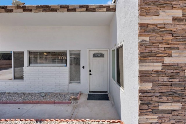 23859 S Rd, Apple Valley, CA 92307 - property entrance with stone siding and stucco siding