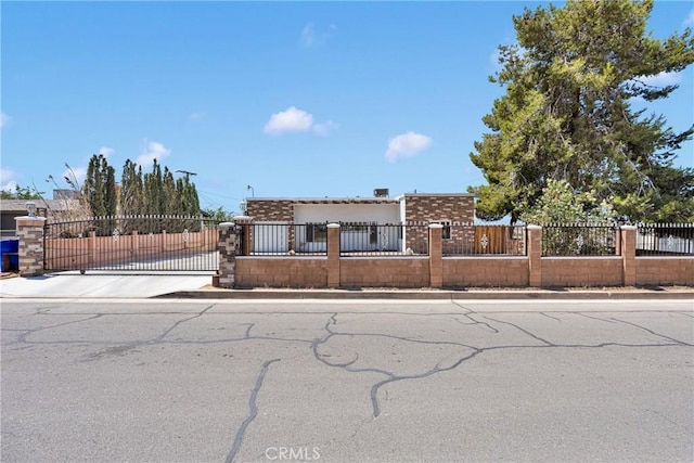 23859 S Rd, Apple Valley, CA 92307 - view of front of home featuring a fenced front yard and stucco siding