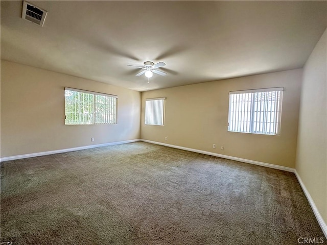 606 W Grand Ave, Pomona, CA 91766 - empty room featuring carpet floors and a ceiling fan