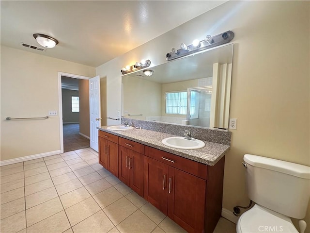 606 W Grand Ave, Pomona, CA 91766 - full bath with double vanity, tile patterned floors, a stall shower, and plenty of natural light