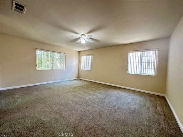 606 W Grand Ave, Pomona, CA 91766 - spare room featuring carpet and ceiling fan