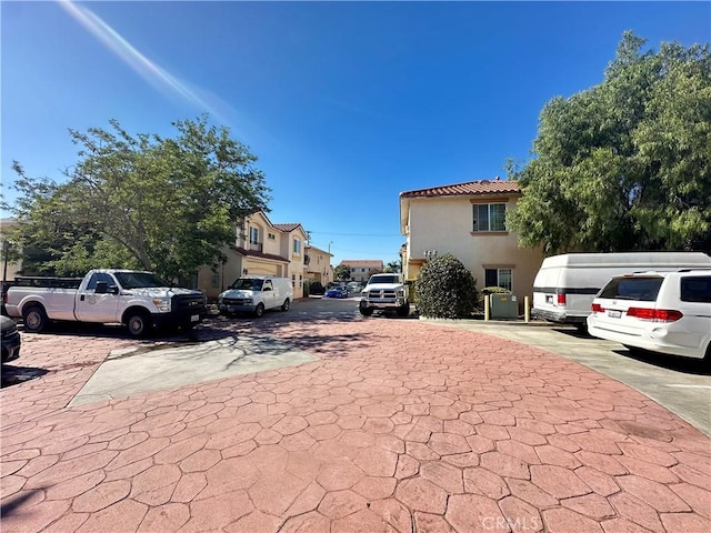 606 W Grand Ave, Pomona, CA 91766 - uncovered parking lot featuring a residential view