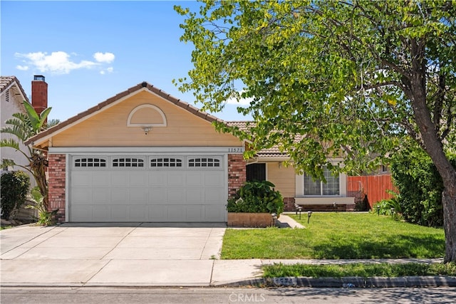 11571 Pinnacle Peak Ct, Rancho Cucamonga, CA 91737 - view of front of house featuring concrete driveway, brick siding, an attached garage, and a tiled roof