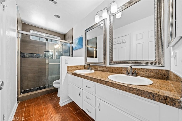 11571 Pinnacle Peak Ct, Rancho Cucamonga, CA 91737 - bathroom featuring a stall shower and double vanity