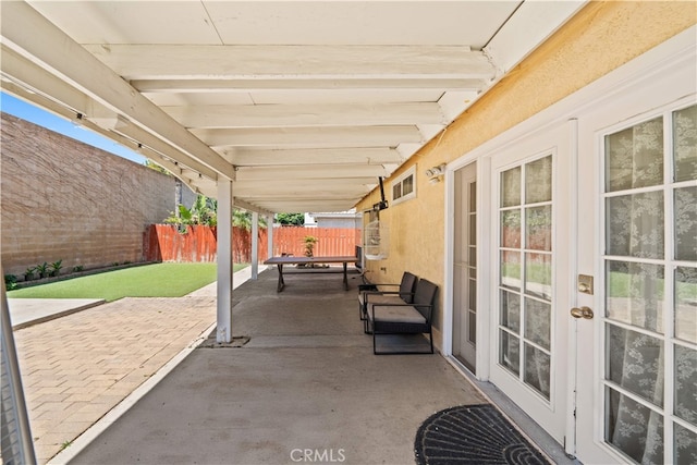 11571 Pinnacle Peak Ct, Rancho Cucamonga, CA 91737 - fenced backyard with french doors and a patio area