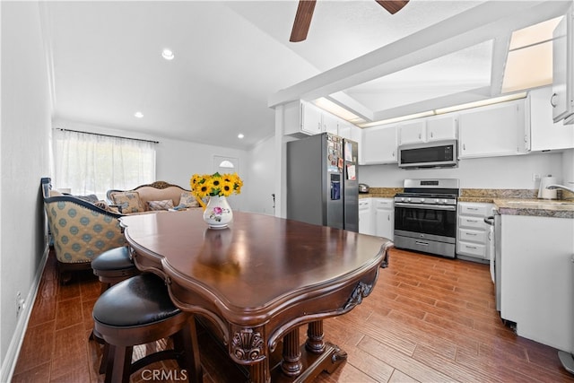 11571 Pinnacle Peak Ct, Rancho Cucamonga, CA 91737 - kitchen featuring stainless steel appliances, white cabinets, ceiling fan, and recessed lighting