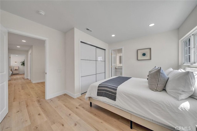 14181 Moore Ct, Irvine, CA 92606 - bedroom featuring light wood finished floors, recessed lighting, and a closet