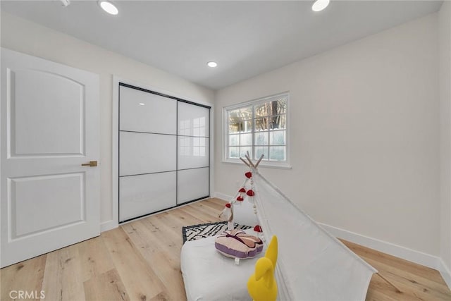 14181 Moore Ct, Irvine, CA 92606 - sitting room featuring light wood-type flooring and recessed lighting