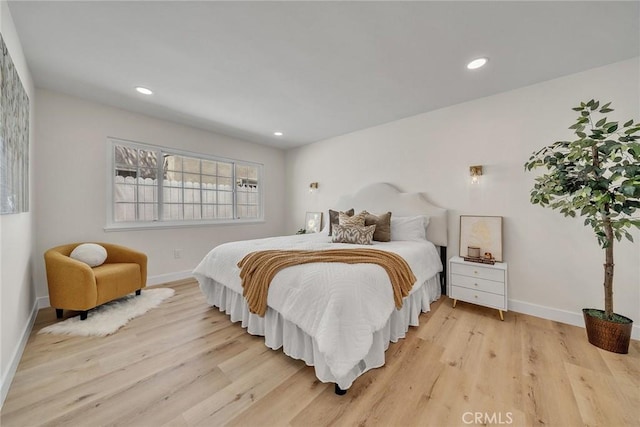 14181 Moore Ct, Irvine, CA 92606 - bedroom with light wood-type flooring and recessed lighting