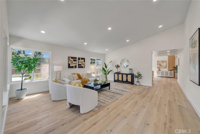 14181 Moore Ct, Irvine, CA 92606 - living room with wood finished floors and recessed lighting
