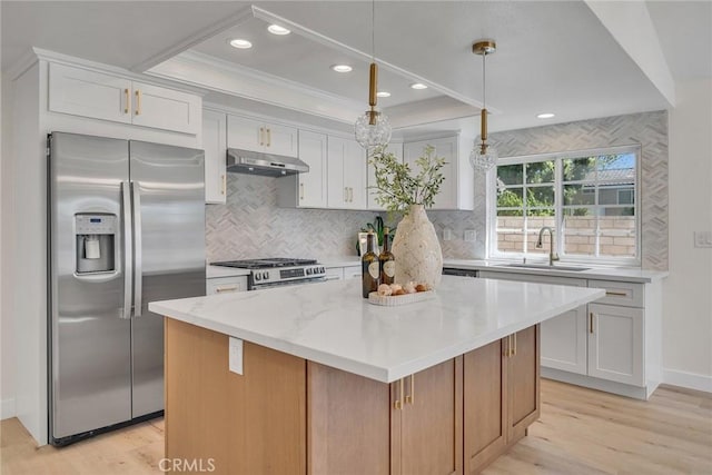 14181 Moore Ct, Irvine, CA 92606 - kitchen featuring appliances with stainless steel finishes, white cabinets, light wood-type flooring, ornamental molding, and recessed lighting