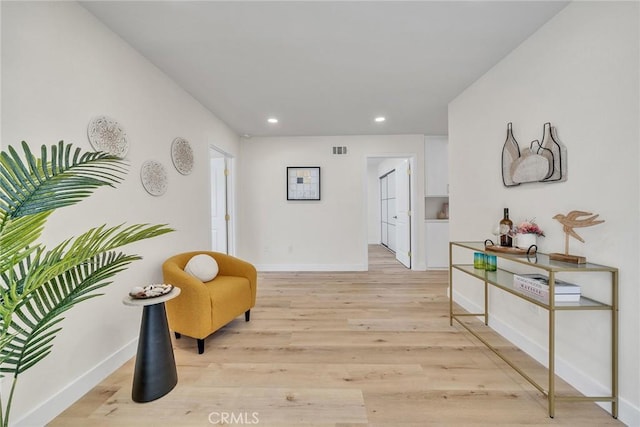 14181 Moore Ct, Irvine, CA 92606 - sitting room featuring recessed lighting and light wood finished floors