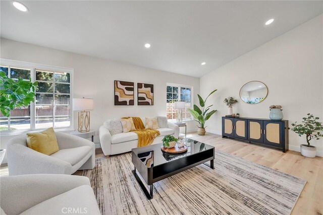 14181 Moore Ct, Irvine, CA 92606 - living area with wood finished floors and recessed lighting