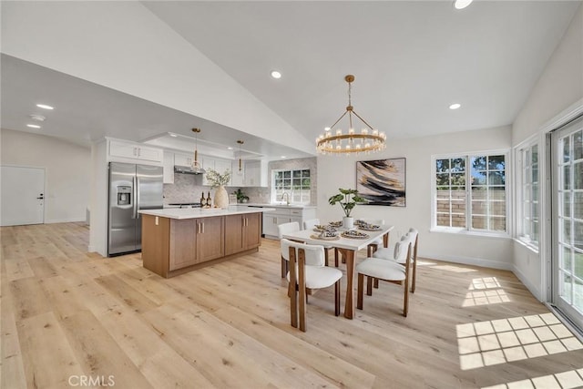 14181 Moore Ct, Irvine, CA 92606 - kitchen featuring stainless steel appliances, light wood-type flooring, light countertops, a kitchen island, and recessed lighting