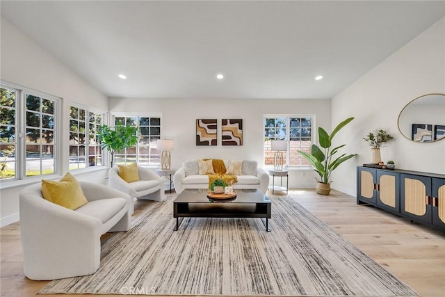 14181 Moore Ct, Irvine, CA 92606 - living area featuring light wood-style floors and recessed lighting