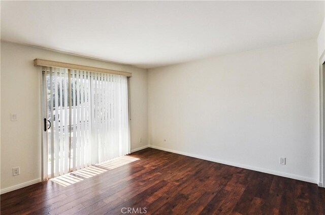 8544 Independence Ave Unit 102, Canoga Park, CA 91304 - unfurnished room featuring wood finished floors and baseboards