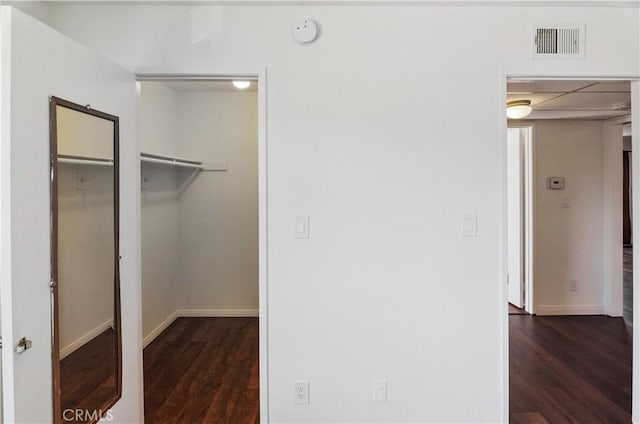 8544 Independence Ave Unit 102, Canoga Park, CA 91304 - unfurnished bedroom featuring dark wood-type flooring