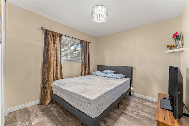404 Atwood Dr, Corona, CA 92879 - bedroom featuring wood finished floors