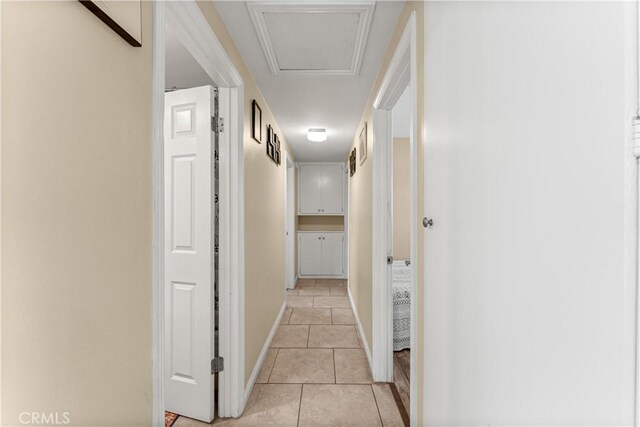 404 Atwood Dr, Corona, CA 92879 - hallway featuring light tile patterned flooring and baseboards