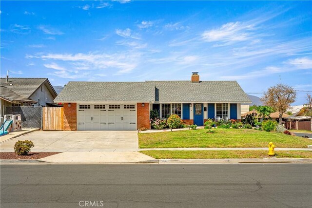 404 Atwood Dr, Corona, CA 92879 - ranch-style house featuring an attached garage, concrete driveway, a chimney, and brick siding