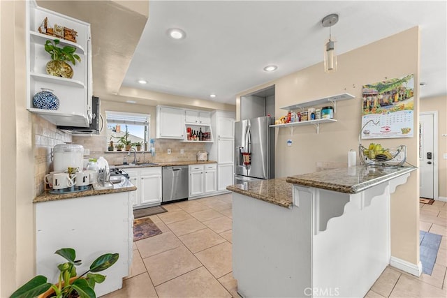 404 Atwood Dr, Corona, CA 92879 - kitchen with open shelves, stainless steel appliances, a peninsula, light tile patterned floors, and stone counters