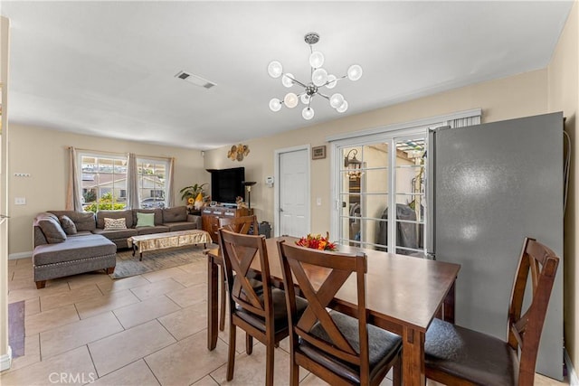 404 Atwood Dr, Corona, CA 92879 - dining space with a chandelier and light tile patterned floors