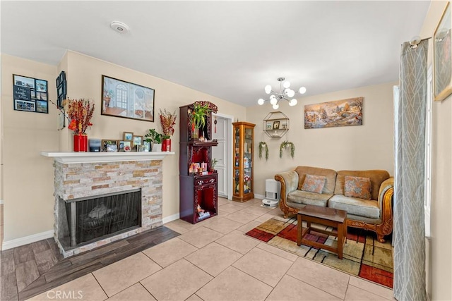 404 Atwood Dr, Corona, CA 92879 - living room featuring a fireplace and baseboards