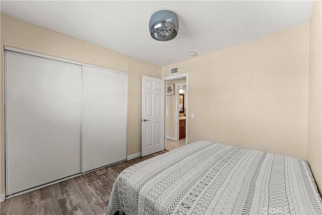 404 Atwood Dr, Corona, CA 92879 - bedroom with wood finished floors and a closet
