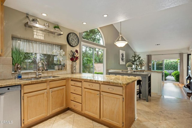 1501 Devonshire Dr, Oxnard, CA 93030 - kitchen featuring stainless steel dishwasher, lofted ceiling, a peninsula, light brown cabinets, and recessed lighting