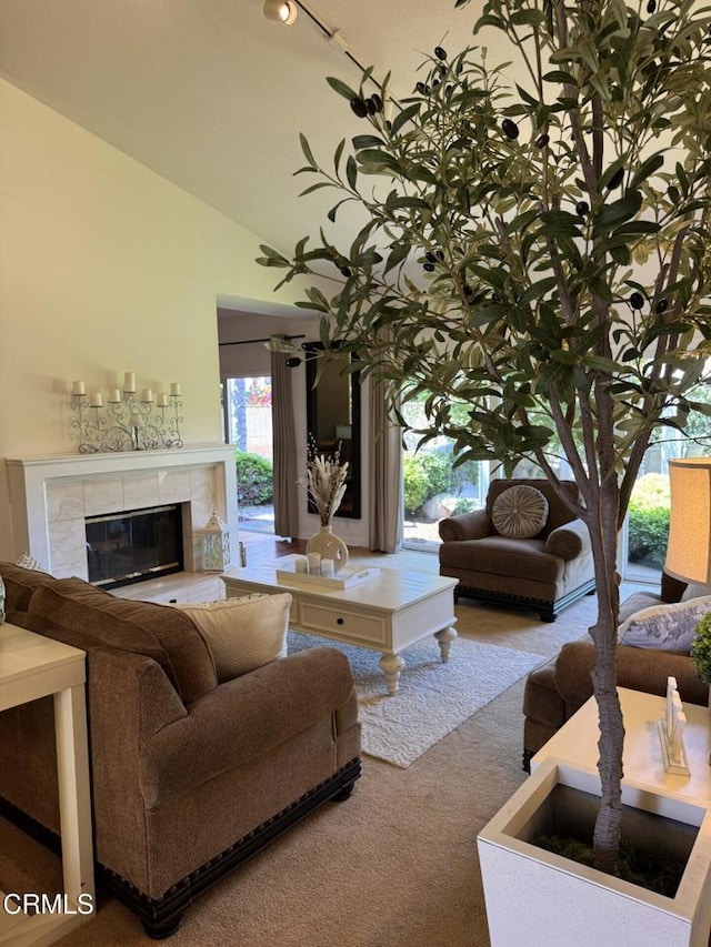 1501 Devonshire Dr, Oxnard, CA 93030 - carpeted living area with a tile fireplace and lofted ceiling