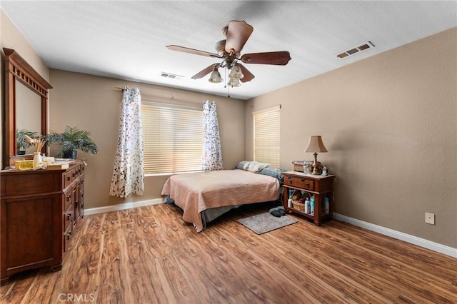 1447 White Cloud Ln, Beaumont, CA 92223 - bedroom with wood finished floors and ceiling fan