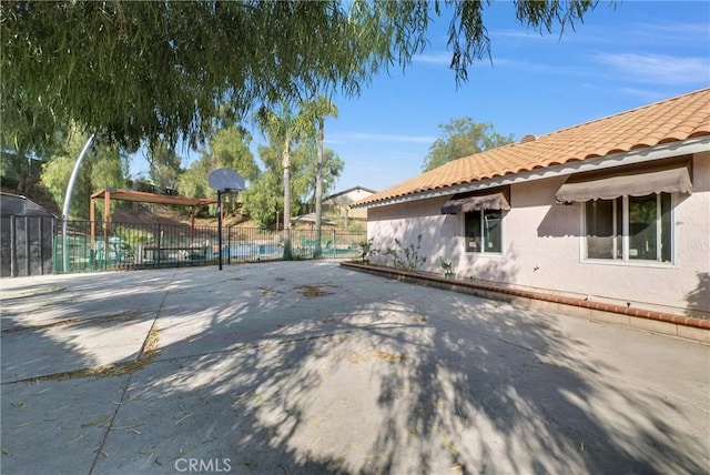 12312 Marmont Pl, Moreno Valley, CA 92557 - view of home's exterior featuring a tiled roof and stucco siding