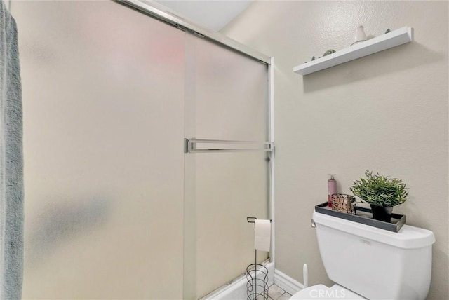 12312 Marmont Pl, Moreno Valley, CA 92557 - bathroom with toilet and shower / bath combination with glass door