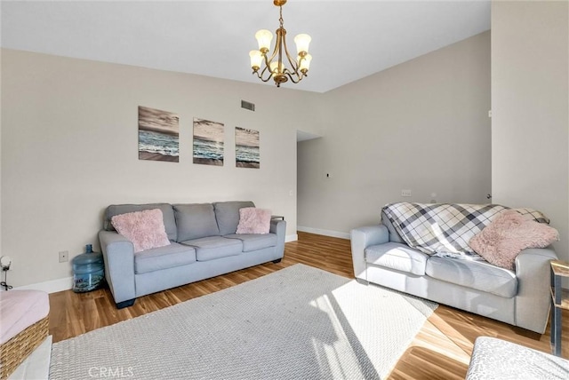 12312 Marmont Pl, Moreno Valley, CA 92557 - living area featuring a chandelier and wood finished floors