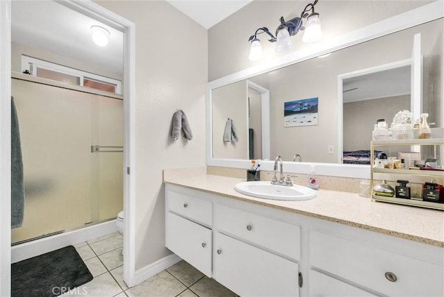 12312 Marmont Pl, Moreno Valley, CA 92557 - full bath featuring a stall shower, vanity, and tile patterned flooring