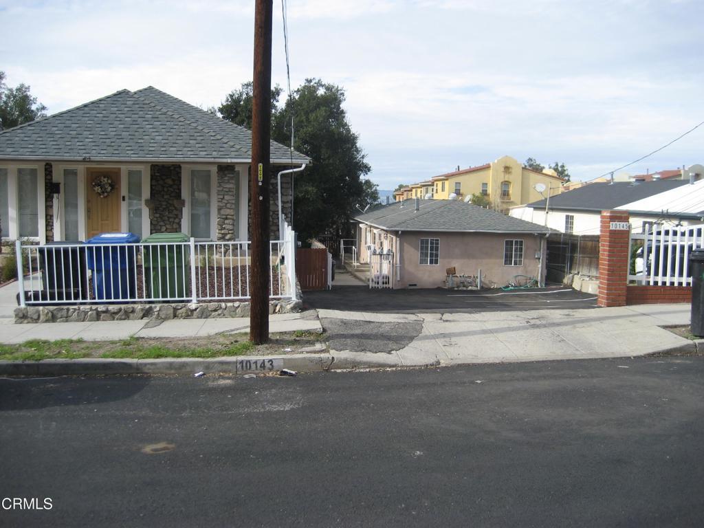 10145 Mountair Ave, Tujunga, CA 91042 - view of front facade featuring a porch and stone siding